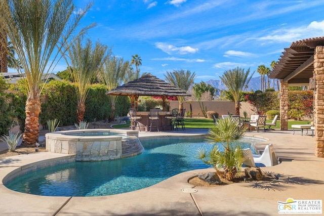 view of pool featuring an in ground hot tub, a gazebo, and a patio