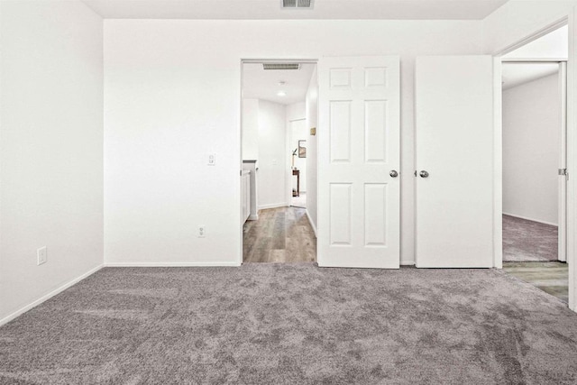 unfurnished bedroom featuring carpet flooring