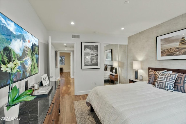 bedroom featuring light hardwood / wood-style floors