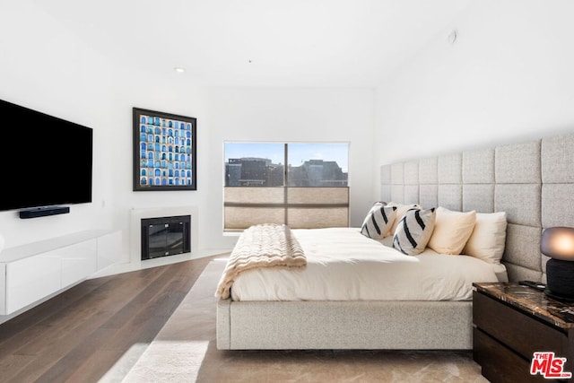 bedroom with light wood-type flooring