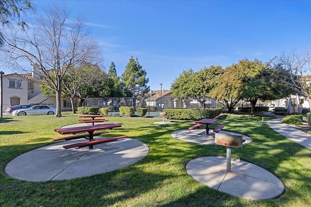 view of community featuring a yard