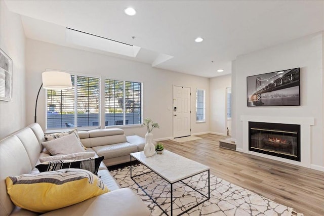 living room with light hardwood / wood-style floors