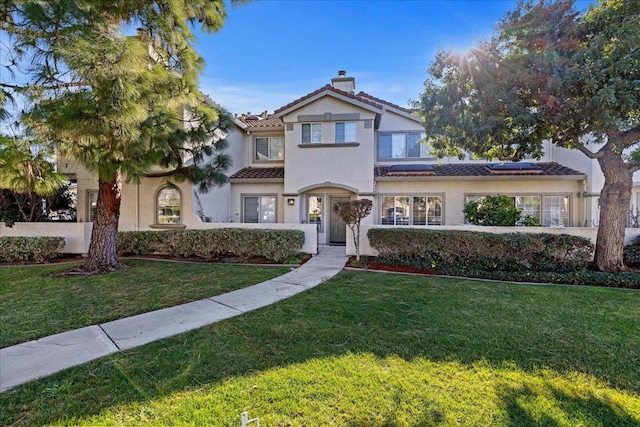 view of front of house with a front yard