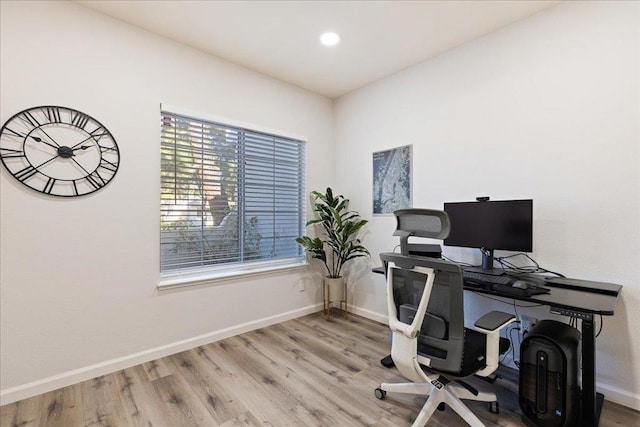 home office featuring light hardwood / wood-style floors