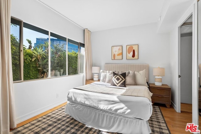 bedroom featuring light hardwood / wood-style floors