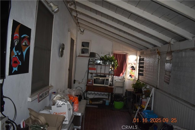 misc room with wooden ceiling and lofted ceiling with beams