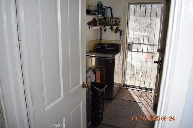 interior space with washing machine and dryer