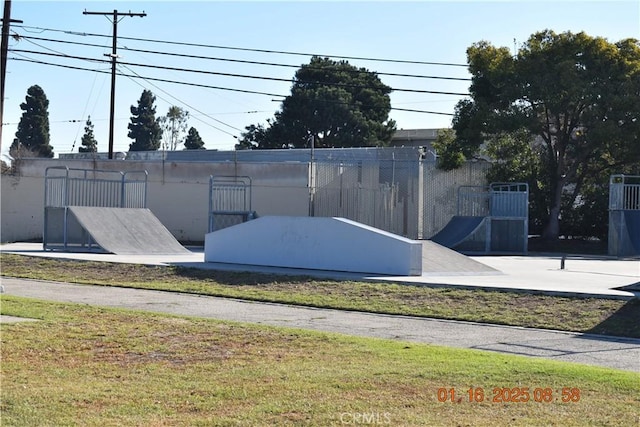 view of storm shelter with a yard