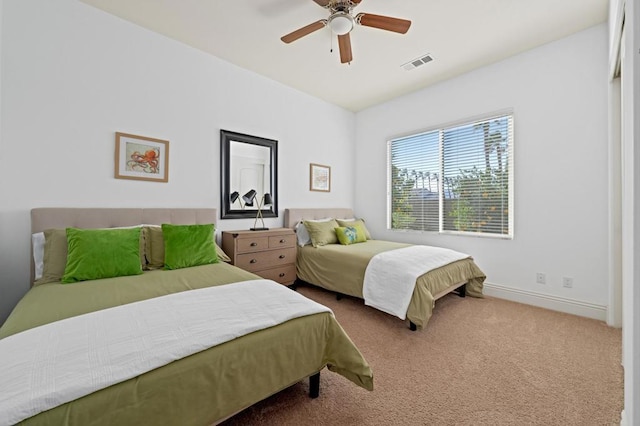 bedroom featuring ceiling fan and carpet floors