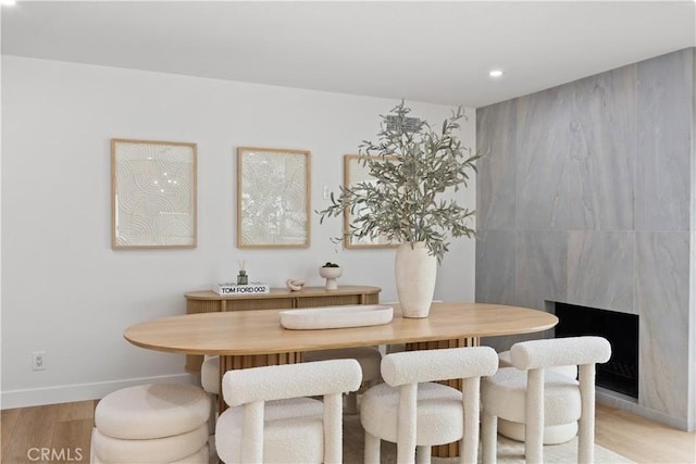 dining area with light hardwood / wood-style flooring