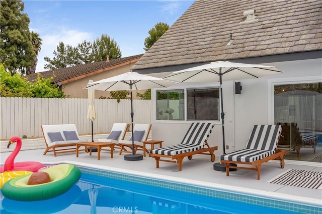 view of pool with a patio area