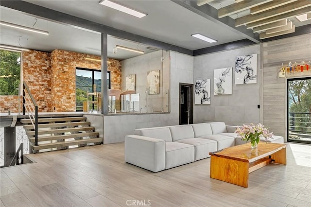 living room with light hardwood / wood-style floors