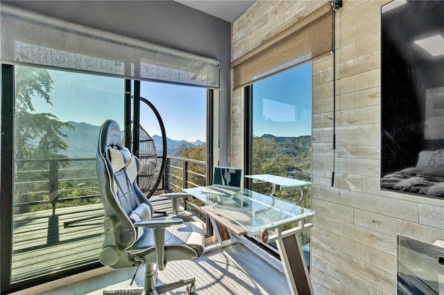 sunroom / solarium with a mountain view