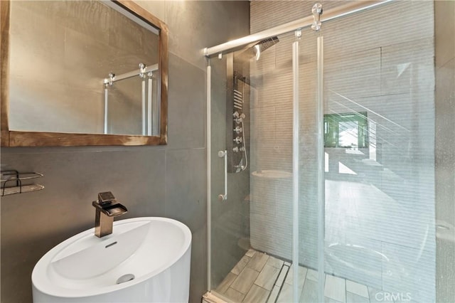 bathroom with sink and walk in shower