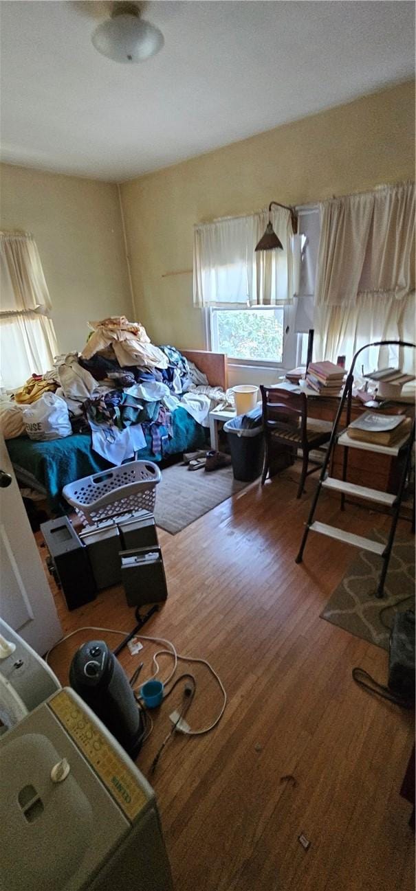 bedroom with wood-type flooring