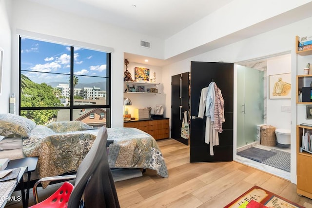 bedroom featuring light hardwood / wood-style flooring