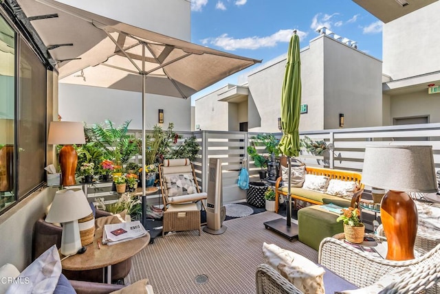 view of patio with a balcony