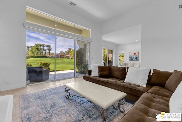 living room featuring light tile patterned floors