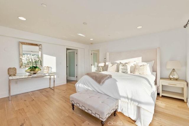 bedroom featuring light hardwood / wood-style flooring