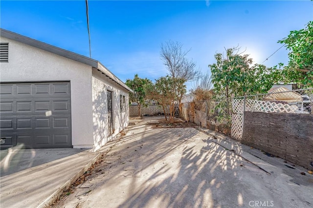 exterior space featuring a garage