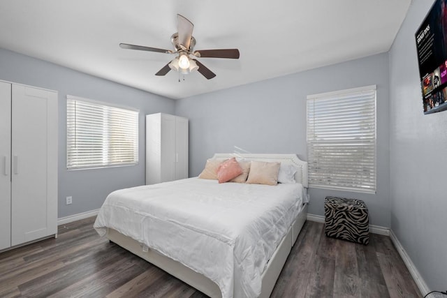 bedroom featuring a closet, ceiling fan, and dark hardwood / wood-style flooring