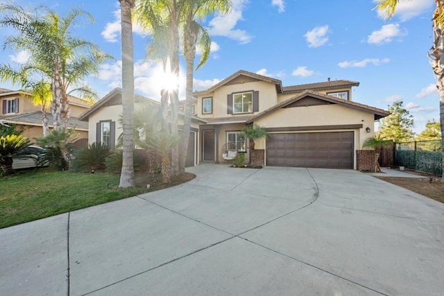 front facade with a garage and a front lawn