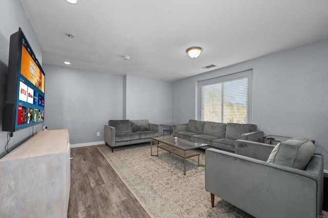 living room featuring dark hardwood / wood-style floors