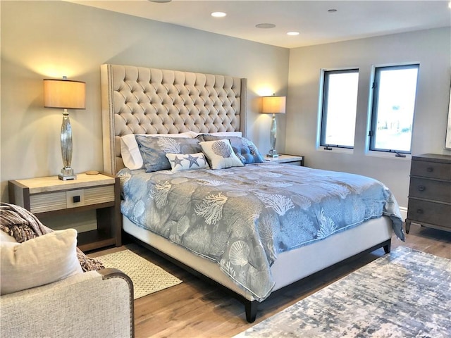 bedroom featuring dark hardwood / wood-style flooring