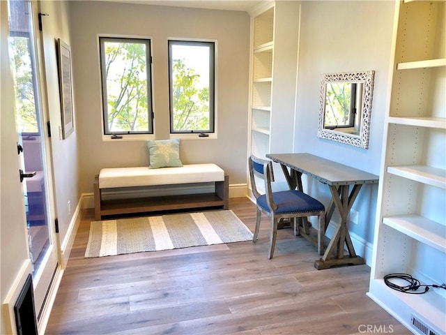 sitting room featuring hardwood / wood-style flooring