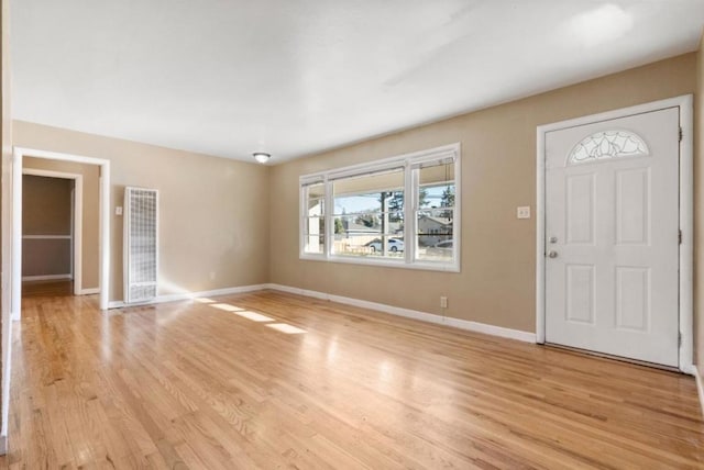 entrance foyer featuring light hardwood / wood-style floors