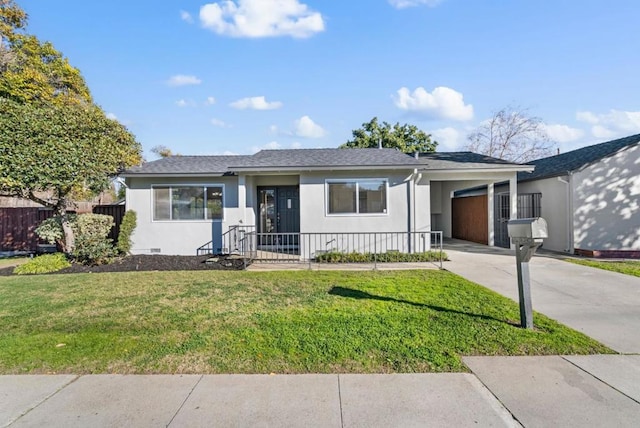 ranch-style house featuring a front lawn