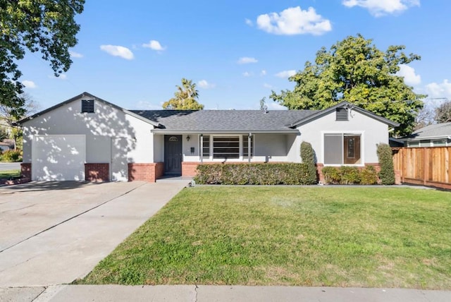 ranch-style house with a garage and a front yard