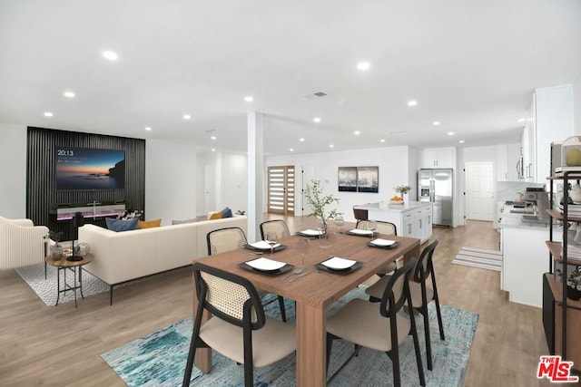 dining area featuring light hardwood / wood-style floors