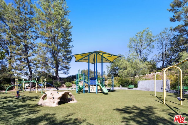 view of play area featuring a yard