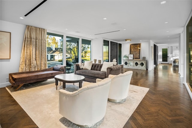 living room with floor to ceiling windows and dark parquet floors