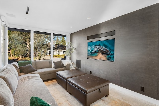 living room with floor to ceiling windows