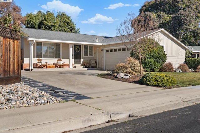 ranch-style house featuring a garage