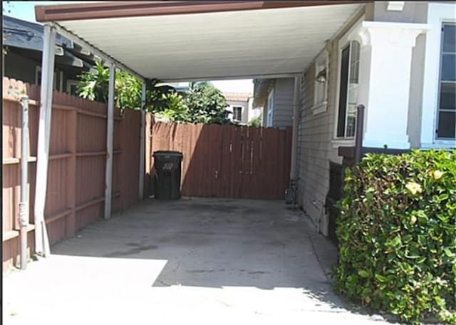 exterior space with a carport