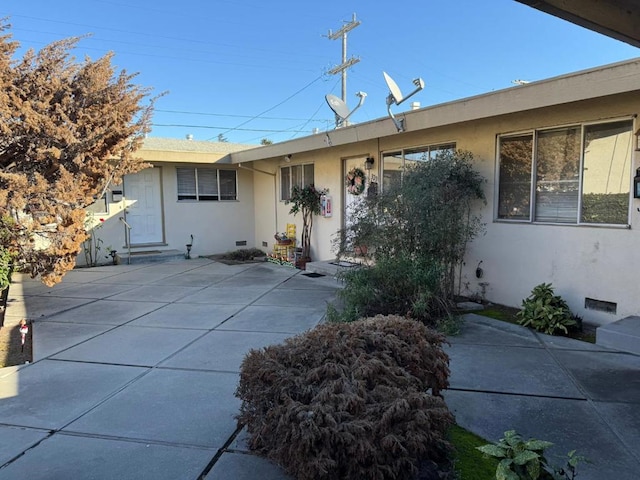 exterior space with a patio area