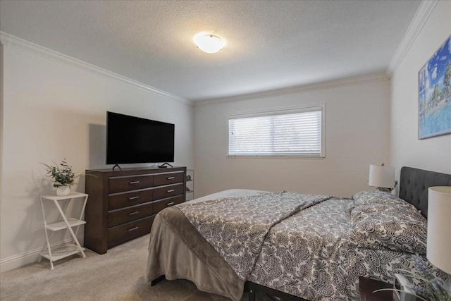 carpeted bedroom featuring ornamental molding and a textured ceiling