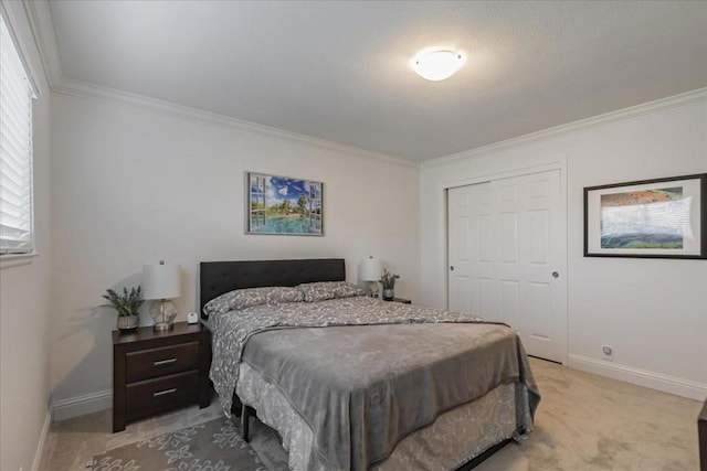 carpeted bedroom featuring a closet and ornamental molding