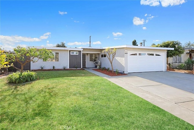 ranch-style house with a garage and a front yard