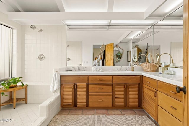 bathroom featuring a shower, tile patterned floors, and vanity