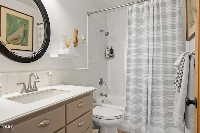 full bathroom featuring vanity, shower / bath combination with curtain, decorative backsplash, tile walls, and toilet