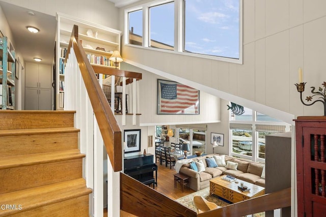 stairway featuring hardwood / wood-style floors