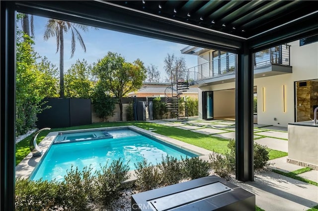 view of pool featuring an in ground hot tub and a patio area