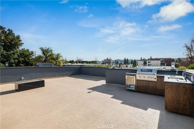 view of patio / terrace featuring sink and grilling area