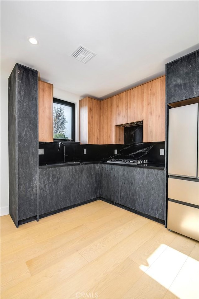 kitchen featuring light wood-type flooring