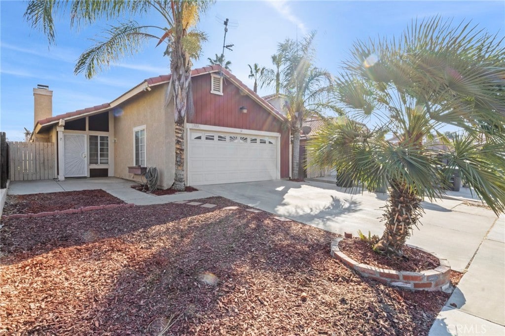 view of property exterior featuring a garage