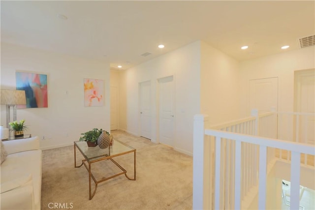 living room with light colored carpet